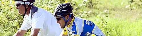 Lance Armstrong rides with Bush